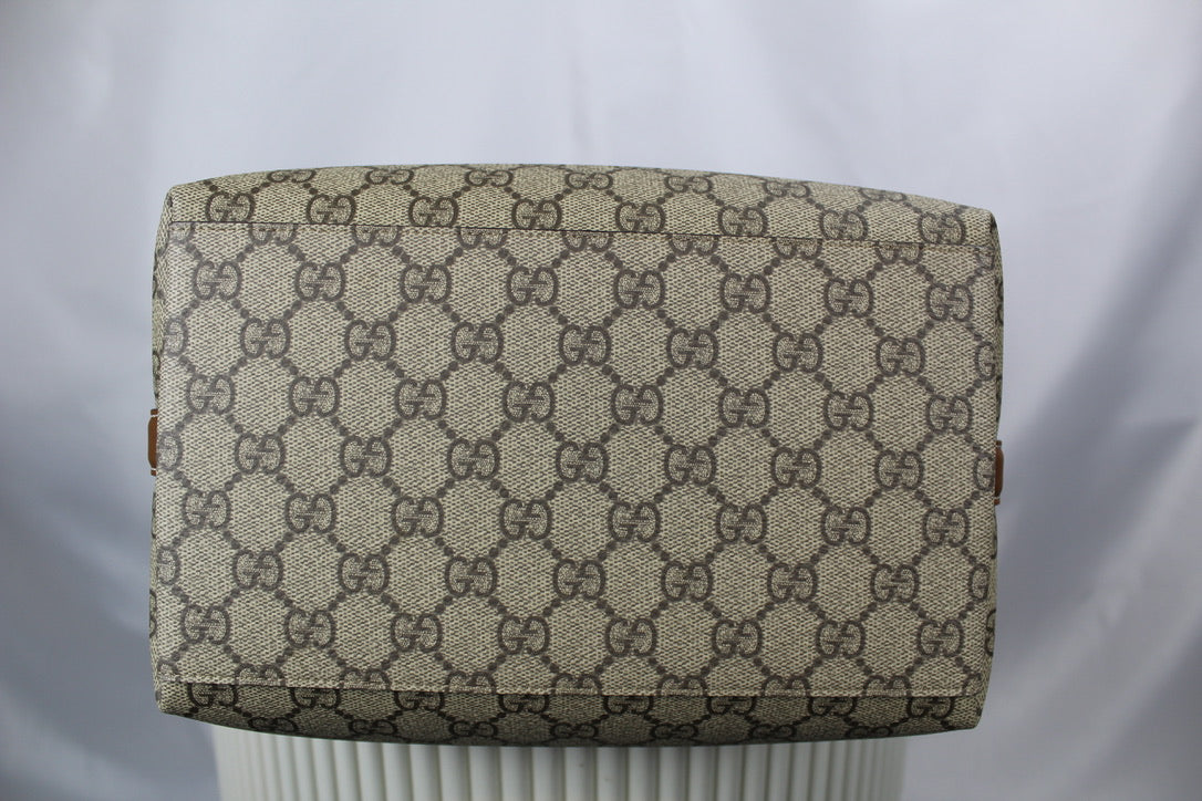 Gucci GG Emblem medium bucket bag
